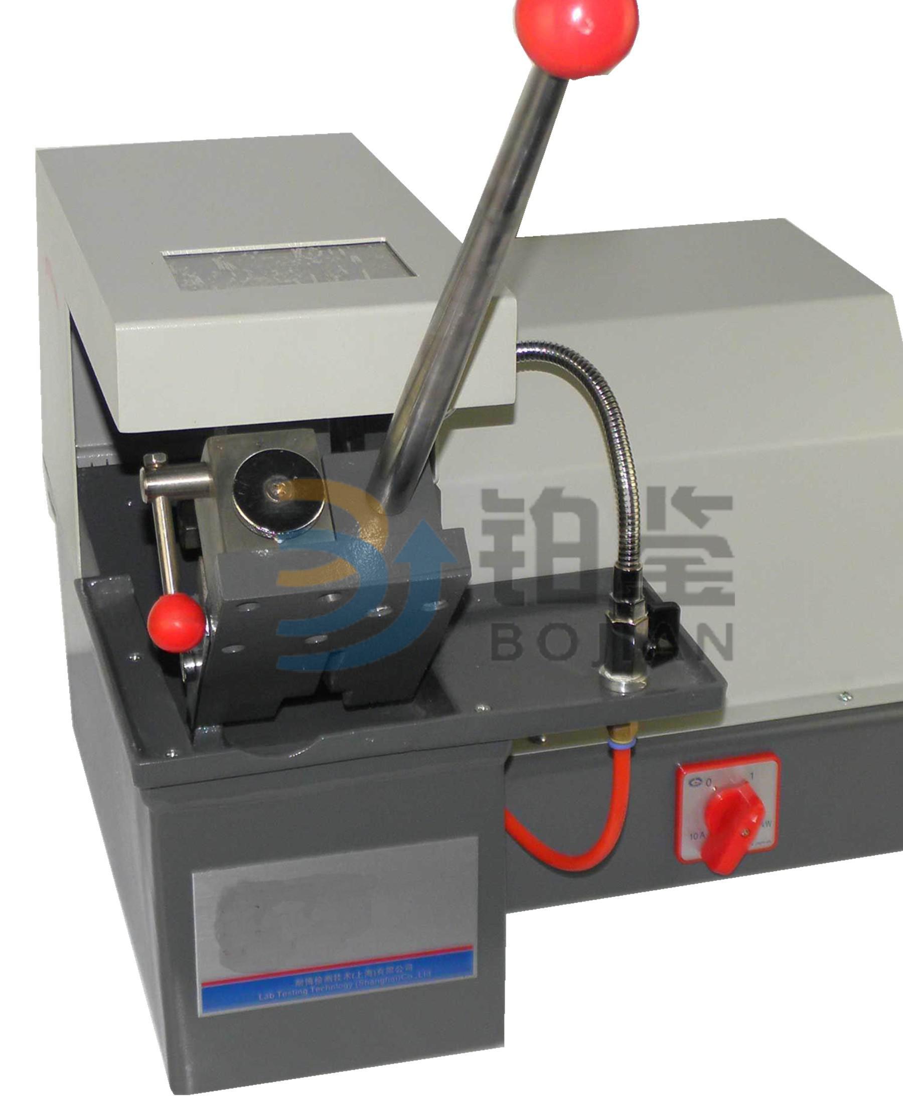 Metallographic specimen cutting machine.